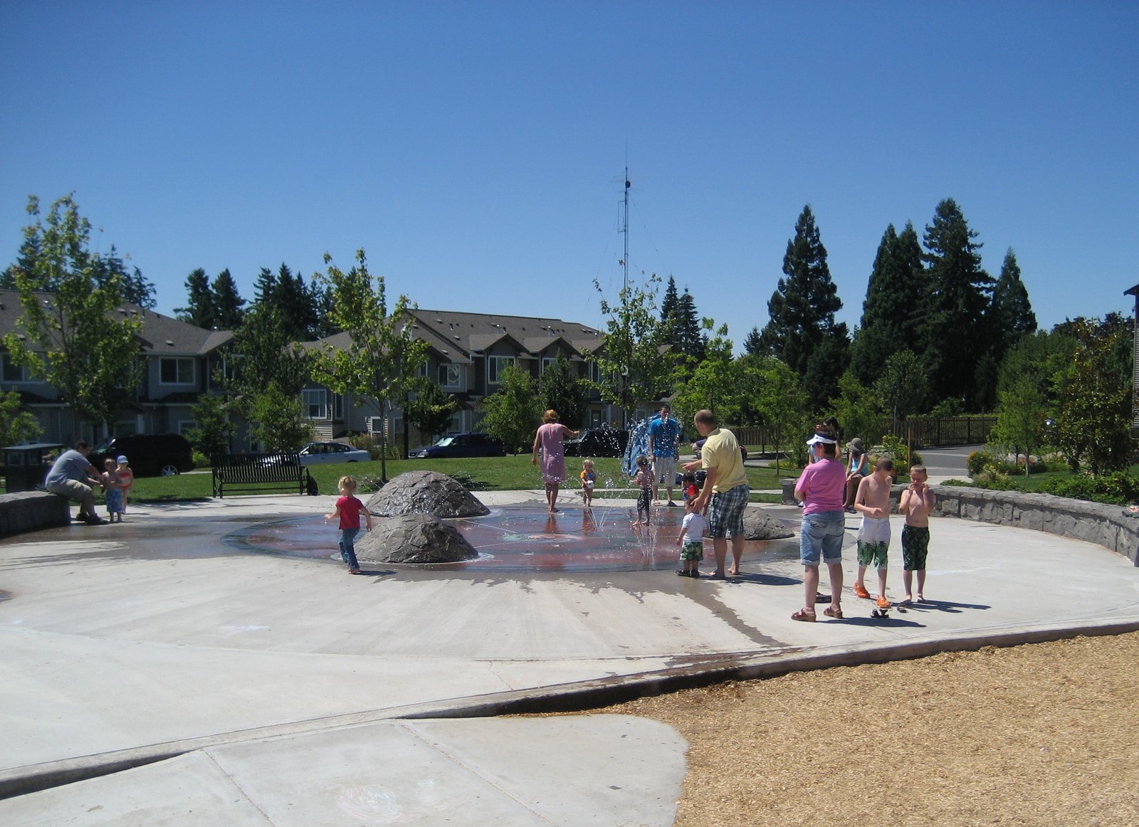 Children playing in the water fountain at Magnolia Park, Hillsboro, Oregon